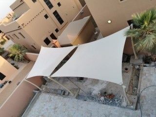 مظلات شد إنشائي للمنازل